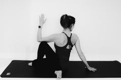 Work- Pogamat Blog- Yoga for Back Pain-seated spinal twist pose