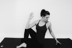 Work- Pogamat Blog- Yoga for Back Pain- seated spinal twist pose
