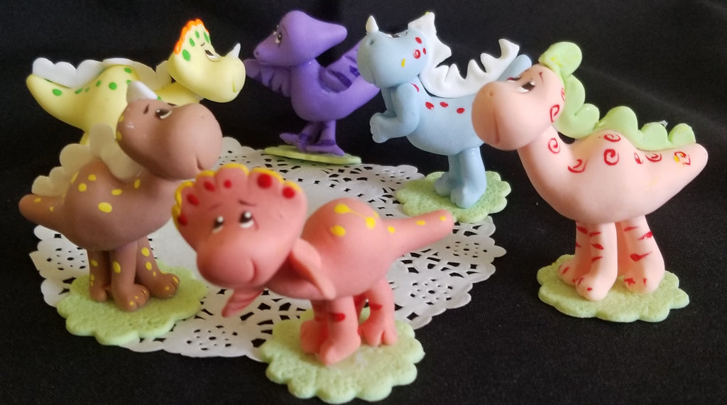 pink dinosaur figurines