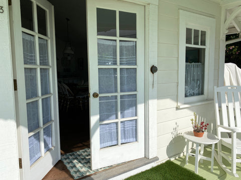 Linen and Letters Door curtain hung with net curtain wire