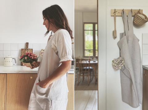 Woman in a linen Japanese Apron carrying radishes. Linen apron elegantly hanging on a wall hook 