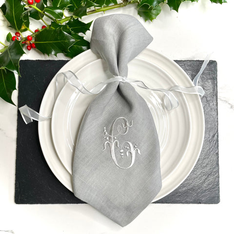 grey linen napkin with silver grey French monogram