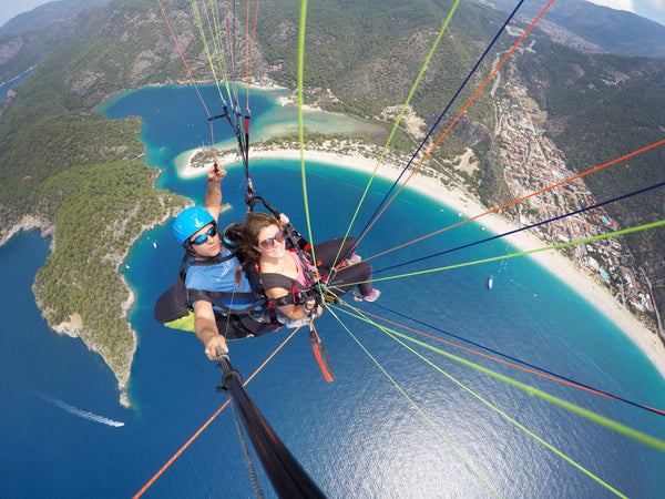 Two Wandering Soles Paragliding in Ölü Deniz, Turkey