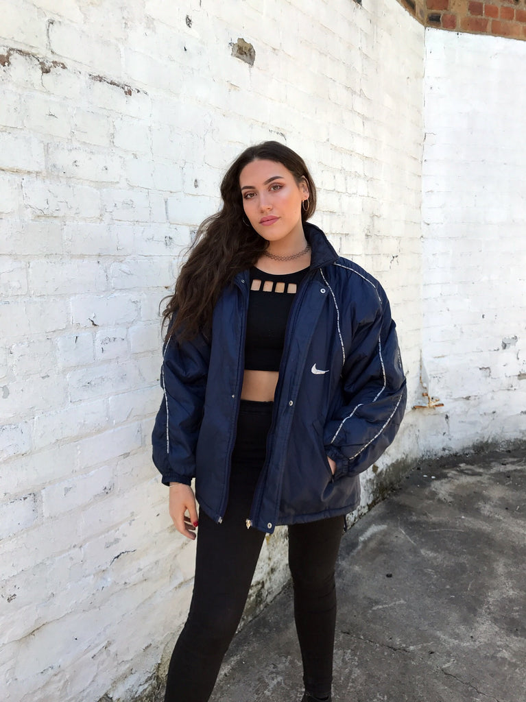 navy blue nike puffer jacket