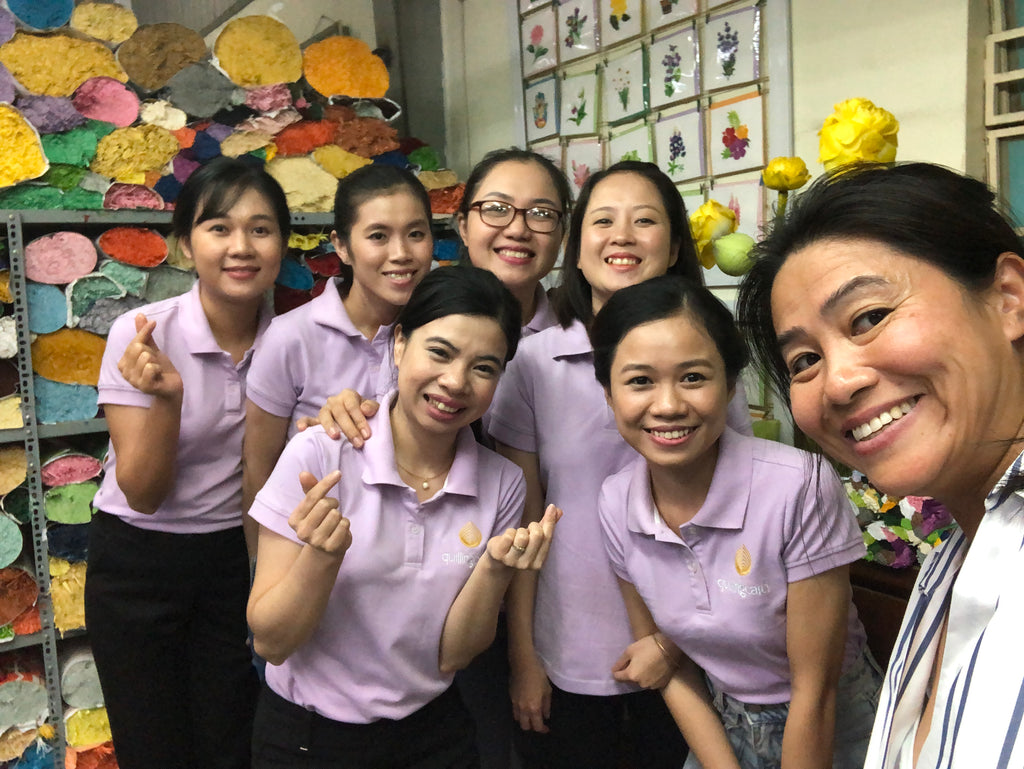 CEO Huong Wolf with Quilling Team in Vietnam