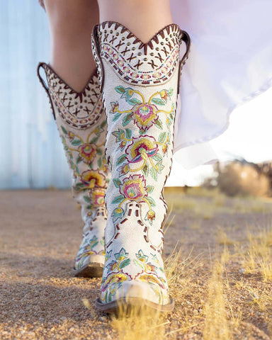 white embroidered boots