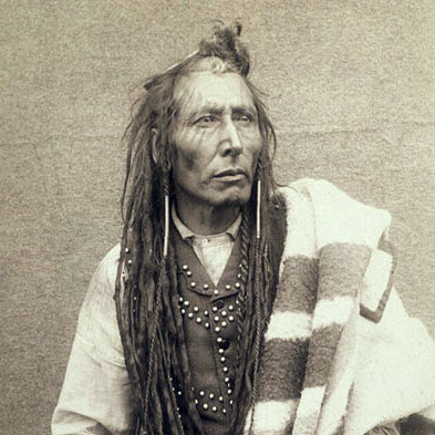 Black and white photo of native indian with dreadlocks