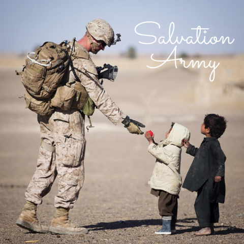 children giving a soldier a red ball