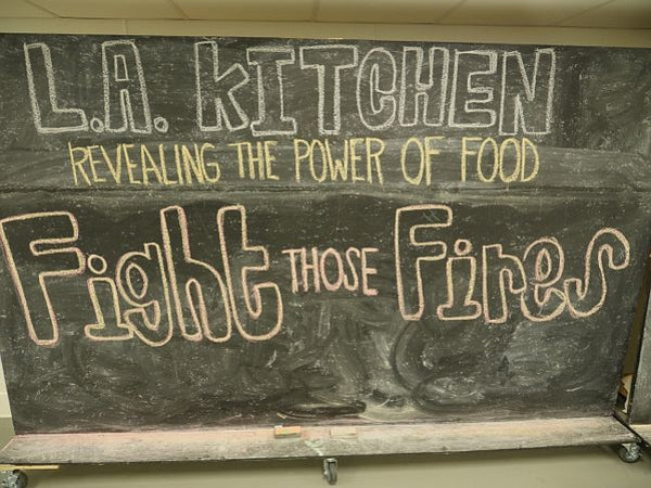 los angeles fighting fires. feeding program. fashion people feeding the less fortunate.