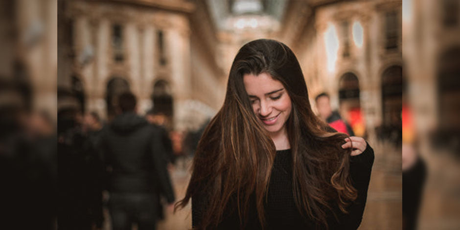 girl wearing black sweater with open hairs