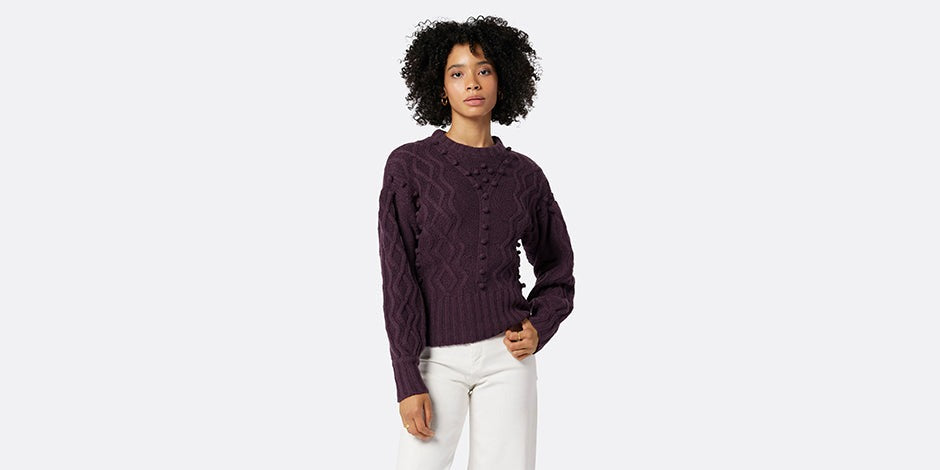women wearing purple knitted sweater