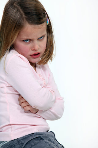 A little girl having a temper tantrum