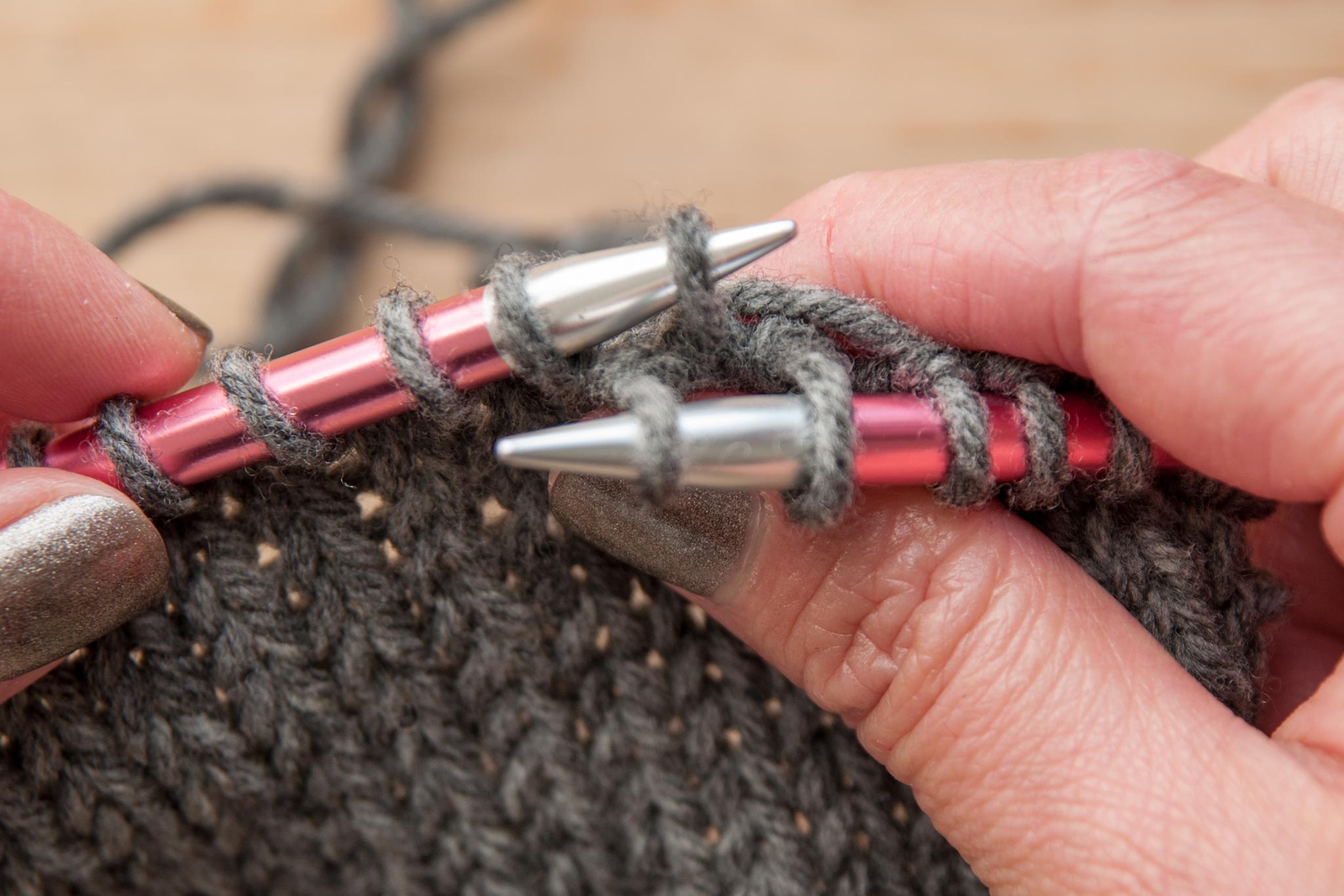 Place the loose stitch onto the left needle.