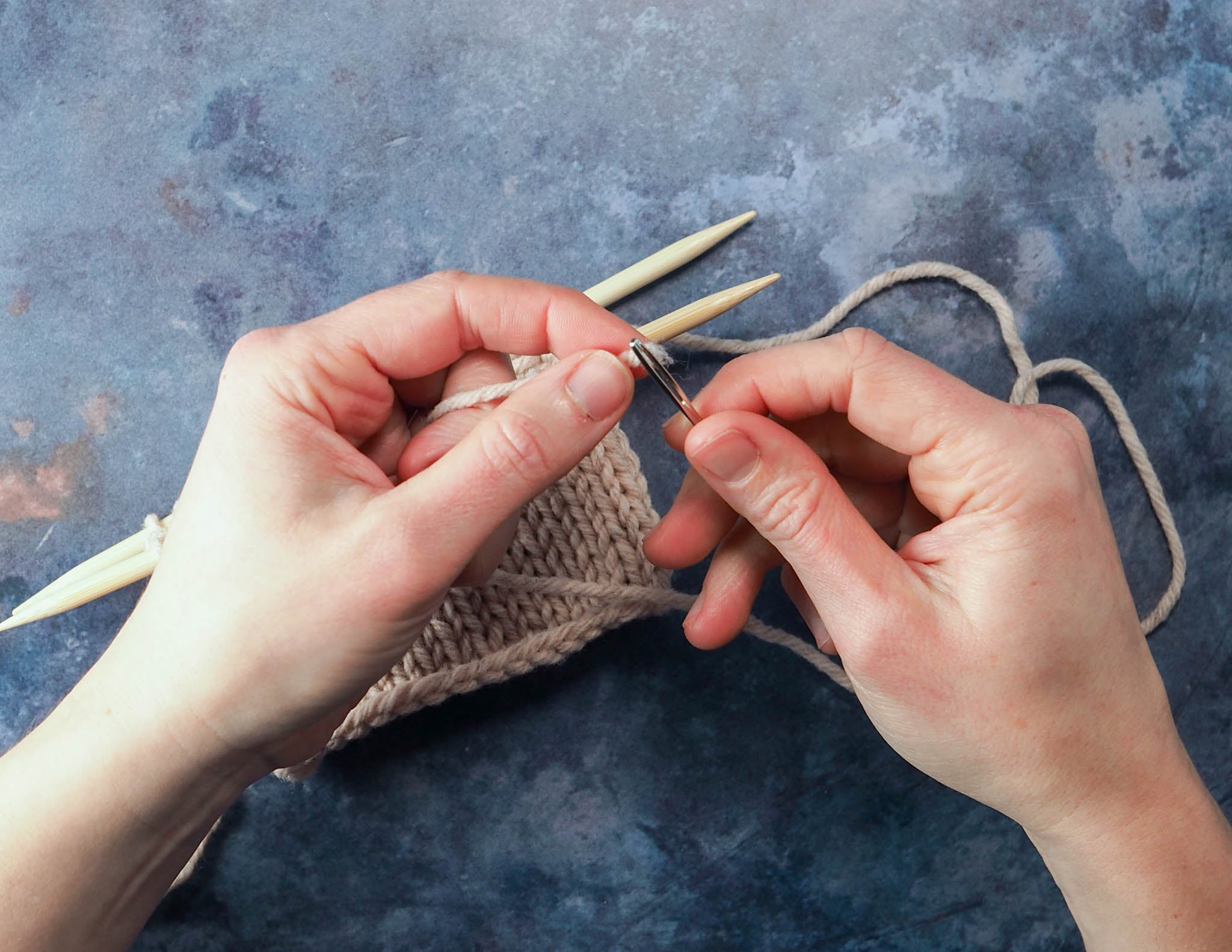 Cut a long tail of yarn and thread it onto a blunt tapestry needle.