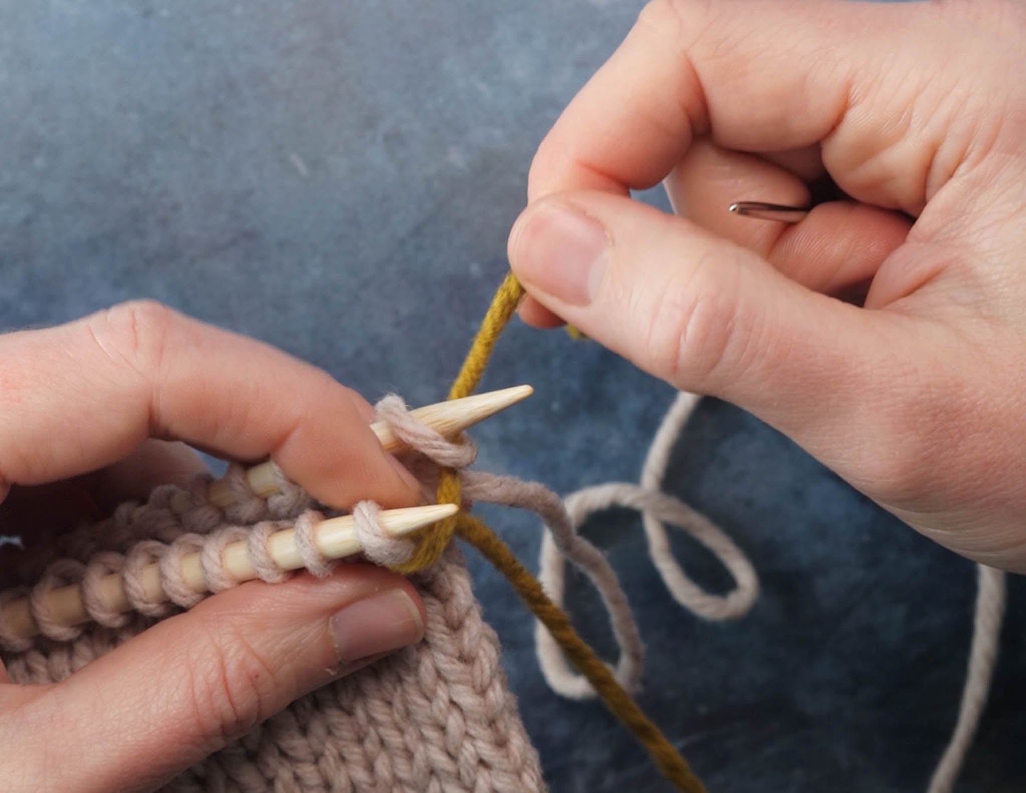 Pull the yarn all the way through.