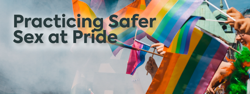 The text reads: "Practicing Safer Sex At Pride" with image of pride flags