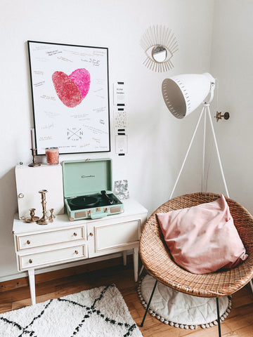 fingerprint guest book alternative hanging on wall in vintage modern living room