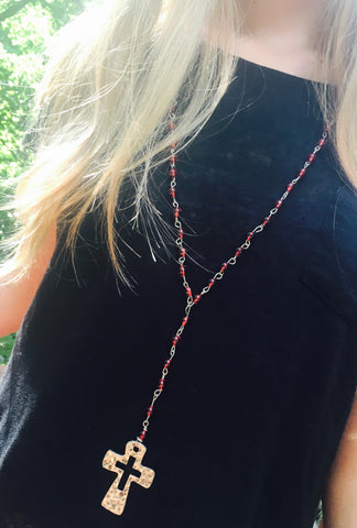 Wire wrapped red beaded necklace with large silver hammered cross pendant