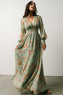 https://cdn.shopify.com/s/files/1/1066/4366/products/olivia-maxi-dress-sage-peach-floral-787105_210x.jpg?v=1689178155}