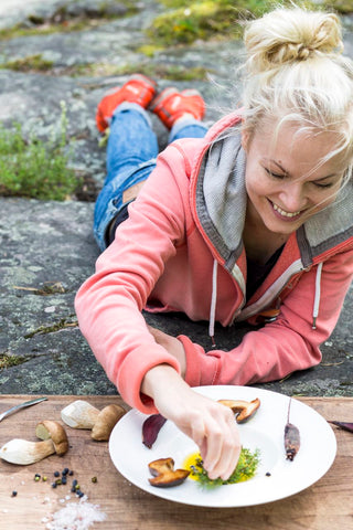 Picture of Annika Hannus enjoying Nordic wild mushrooms