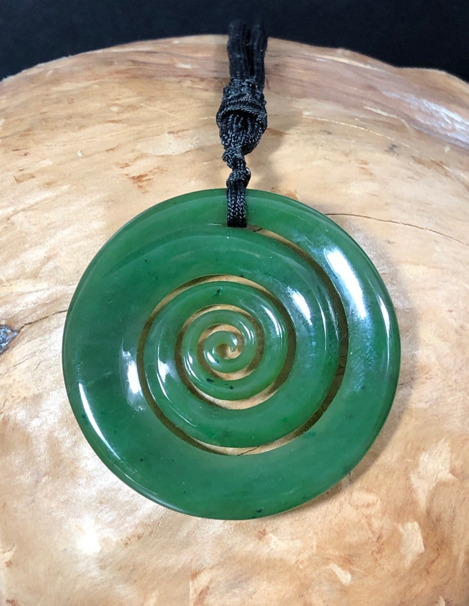 jade spiral pendant