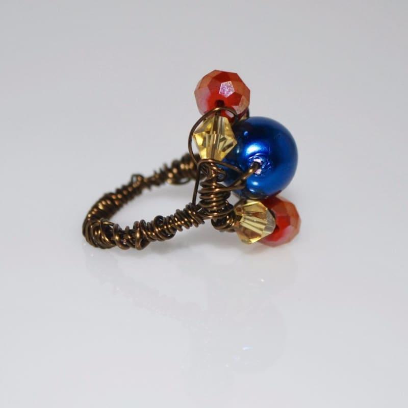 Two beads blue and red bronze wire ring