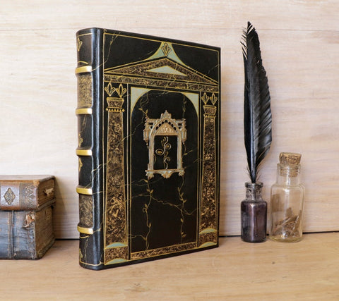 Black and gold leather journal