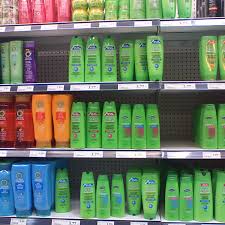 A store shelf filled with hair care products