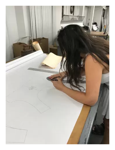 Adeline at drawing board