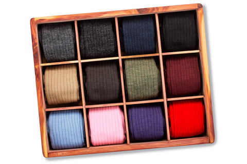 wooden gift box full of colorful dress socks