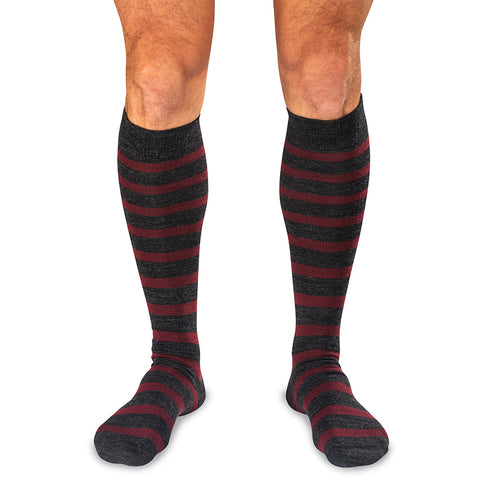 striped wool over the calf dress socks worn by model