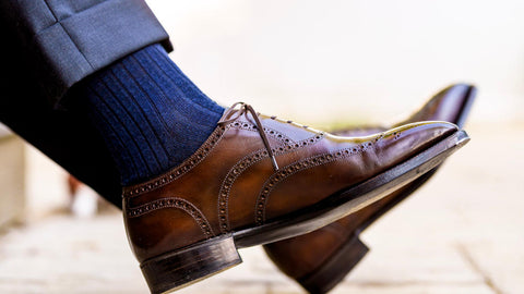 navy dress socks with light navy suit and brown wingtips