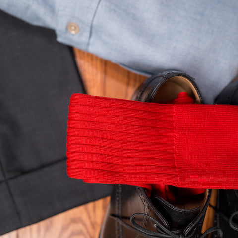 solid red cotton dress socks paired with classic business attire