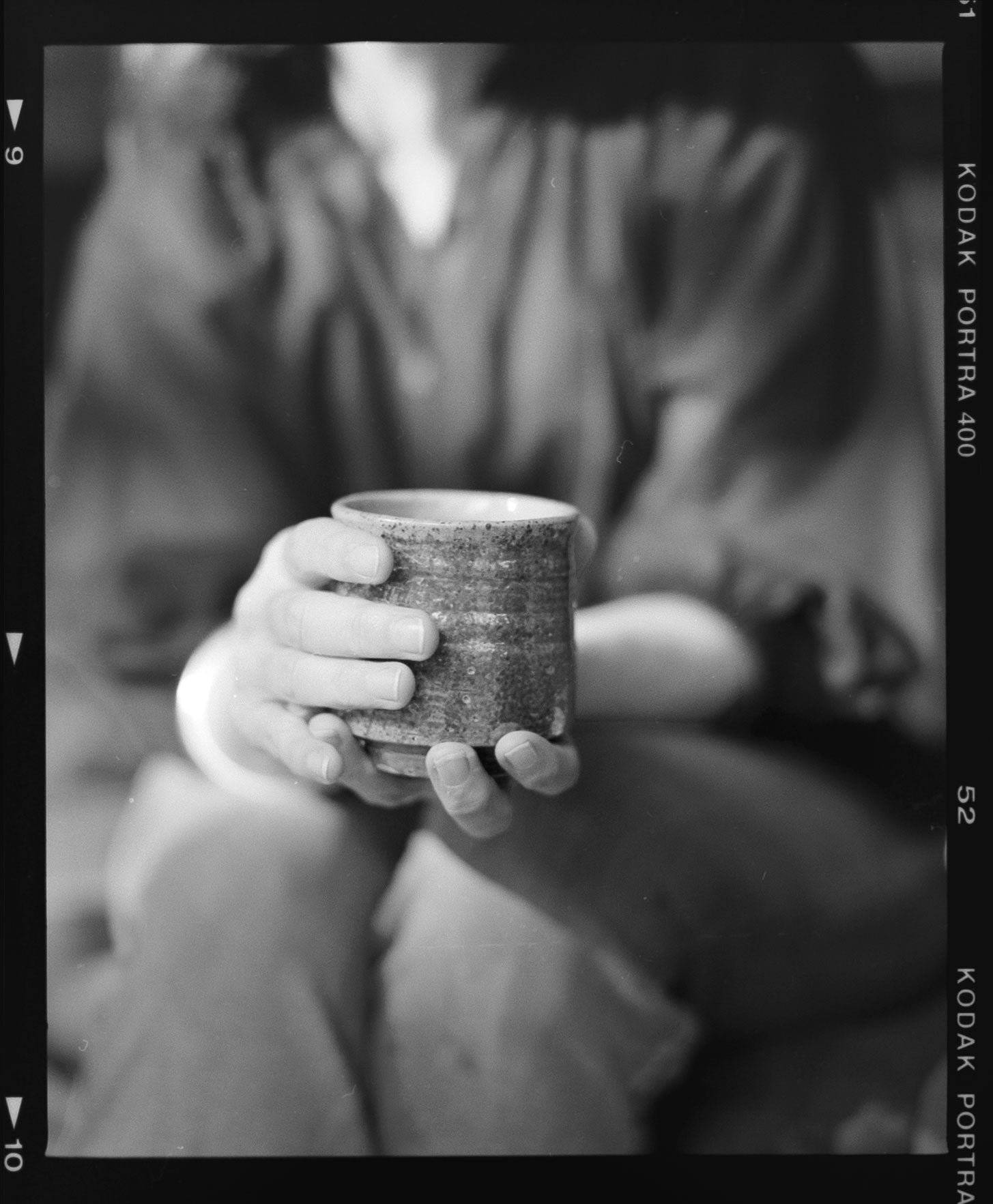 Hayley with one of her ceramic mug creations