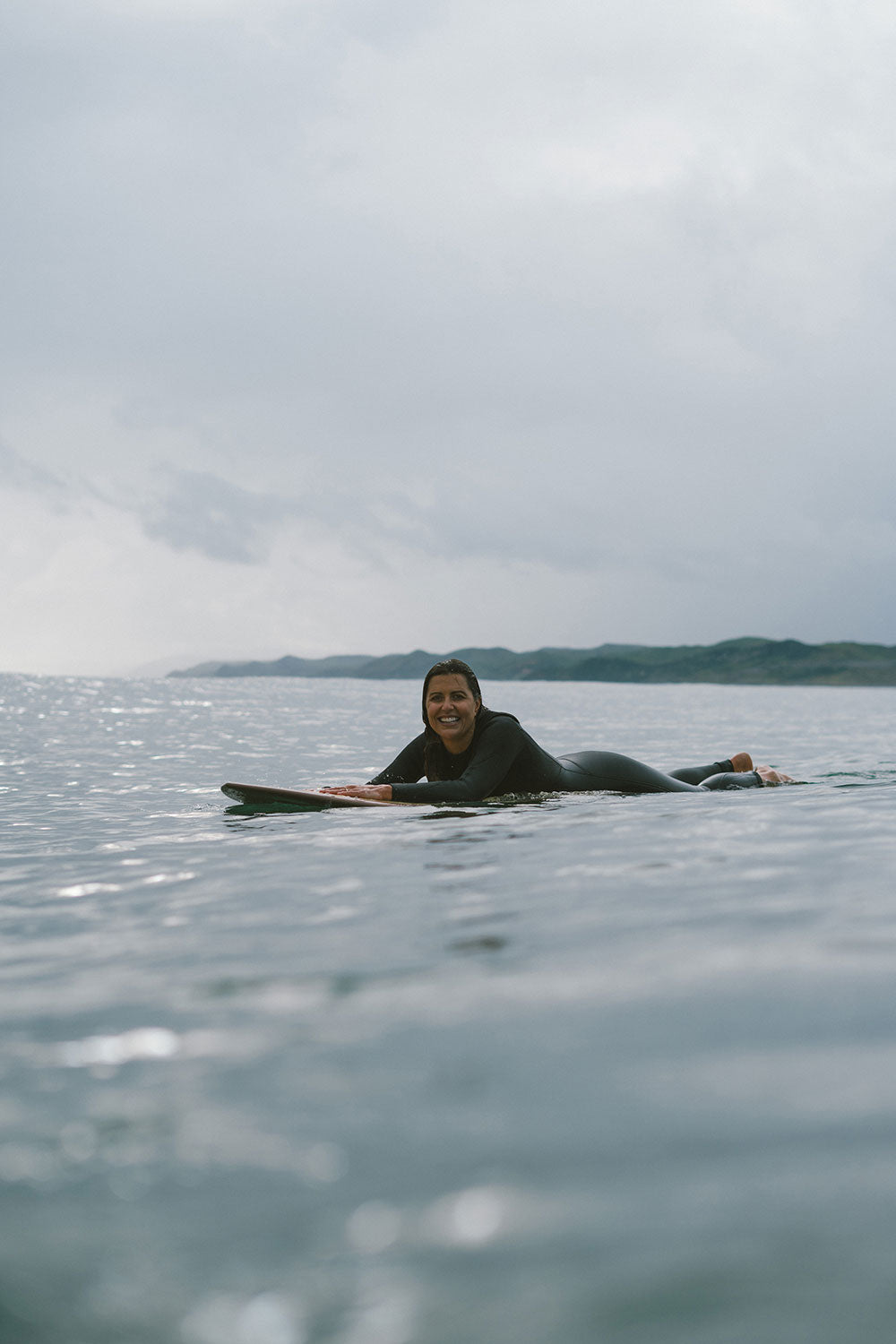 Ella on the water at Raglan