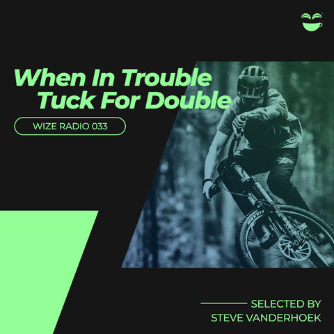 A picture of a Spotify playlist cover with an athlete riding a mountain bike in the background.