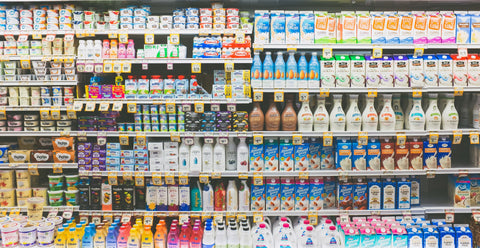 An image of a supermarket store shelf showing mostly dairy products.