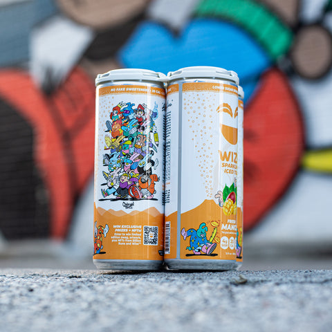 An image of two Wize x Billion Buns cans in the foreground with Chairman Ting's mural in the background.