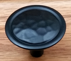 Rustic hammered cabinet knob with a matte black finish.