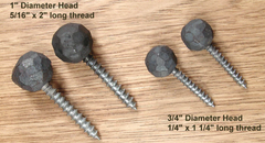 Hammered iron ball head lag screws with a 1" diameter.