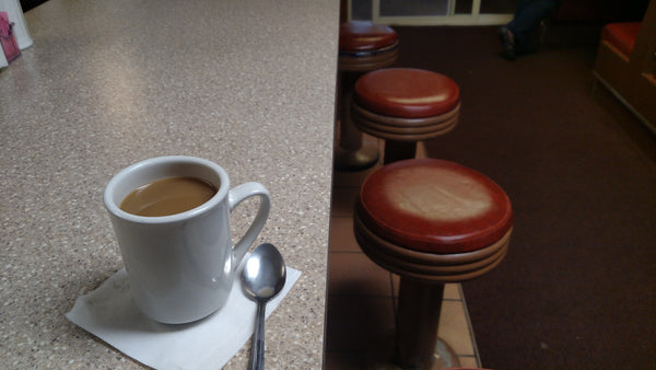 coffee cup on a bar at an old American diner