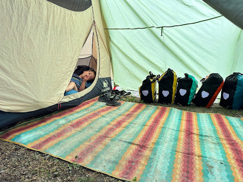 meadow mat in the back of their tent