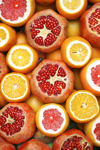 An array of grapefruit and oranges
