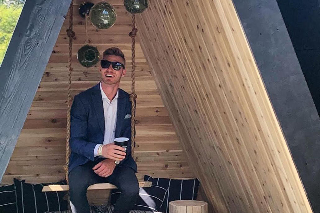 Keegan Morrone, president and CEO of the local architecture and interior design studio AstonMorrone Designs, in the winning reading fort of Barley & Smoke 2019 by Leanne Bunnell and Unique Projects.
