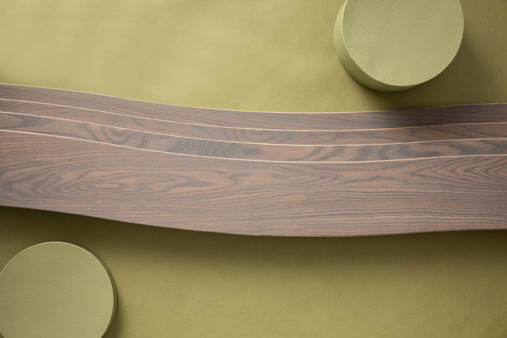 Wave is a curved wooden plank from Wave from the Enigma Collection by Jamie Beckwith