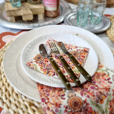 sabre-bistrot-fork-spoon-spreader-set-fern-green, on table