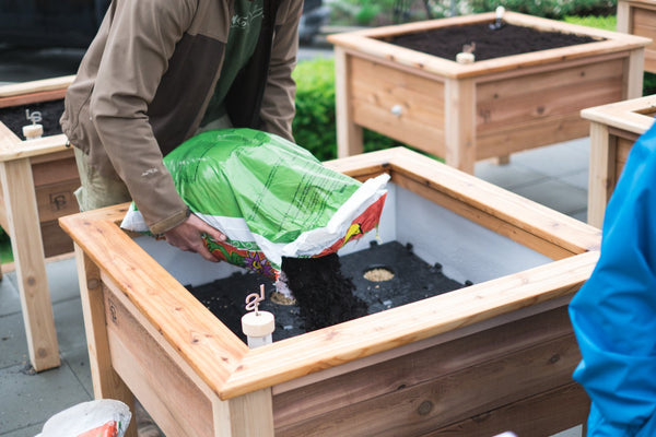 Self-Watering elevated accesibility garden. Cedar raised beds, container gardens, and veggie/vegetable gardens featuring GardenWell sub-irrigation to create wicking beds for growing your own food.