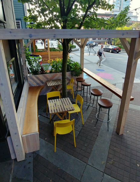 Self-Watering elevated restaurant garden. Cedar raised beds, container gardens, and veggie/vegetable gardens featuring GardenWell sub-irrigation to create wicking beds for growing your own food.