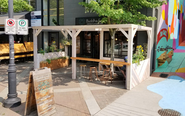 Self-Watering elevated restaurant garden. Cedar raised beds, container gardens, and veggie/vegetable gardens featuring GardenWell sub-irrigation to create wicking beds for growing your own food.