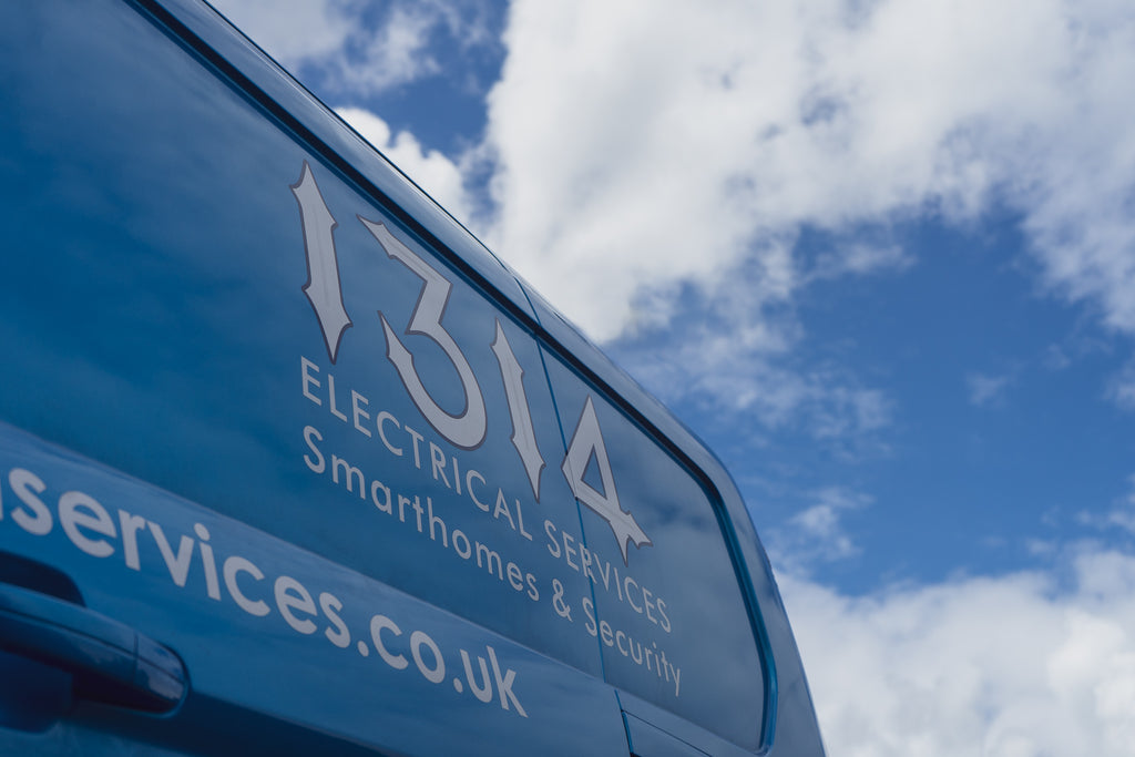 1314 Electrical services Scotland van on blue sky background